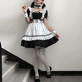 Costume de soubrette avec manchettes et nœud