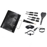 Kit Dominatrice Minuit : pochette et pièces disposées, noir
