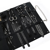 Kit Dominatrice Minuit : pochette ouverte avec chaîne, noir