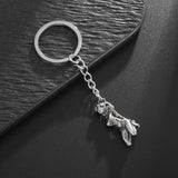 Porte-Clés Bondage Métal : porte-clés métal argenté silhouette féminine attachée, photo 3