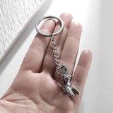 Porte-Clés Bondage Métal : porte-clés métal argenté silhouette féminine attachée, photo 5
