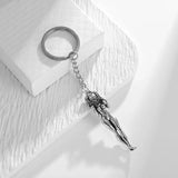 Porte-Clés Bondage Métal : porte-clés métal argenté silhouette féminine attachée, photo 6
