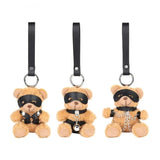 Porte-Clés Ourson Bandeau : ourson en peluche aux yeux bandés sur lanière noire, photo 1